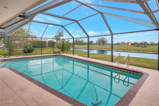 view of swimming pool with a water view, a patio area, glass enclosure, and a lawn