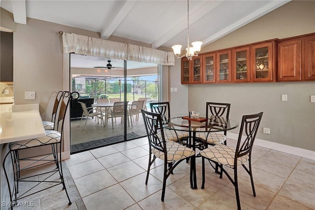 tiled dining room with ceiling fan with notable chandelier and lofted ceiling with beams