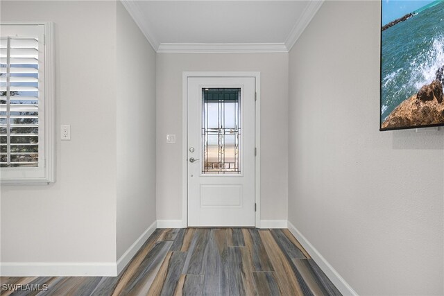 entryway featuring ornamental molding and dark wood-type flooring