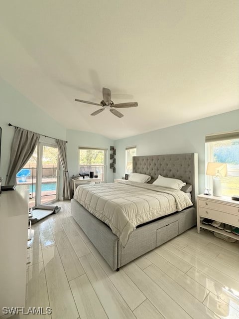 bedroom with access to exterior, ceiling fan, wood tiled floor, and vaulted ceiling