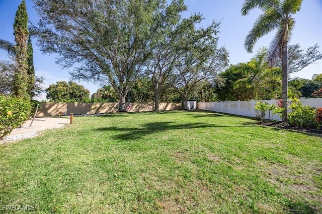 view of yard featuring a fenced backyard