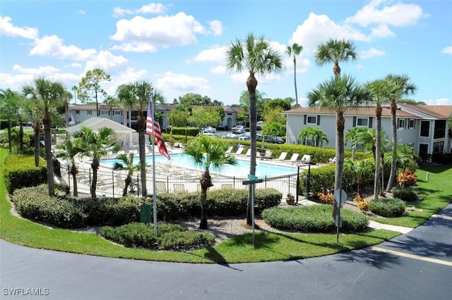 view of property's community with a swimming pool