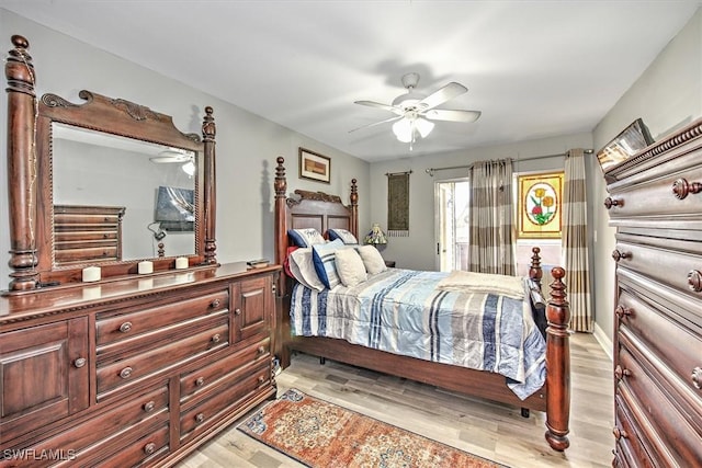 bedroom with light wood-type flooring and ceiling fan