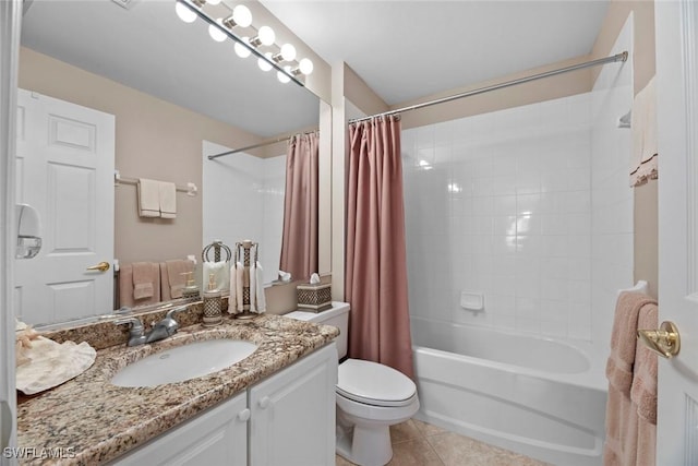 full bathroom featuring tile patterned floors, vanity, toilet, and shower / bathtub combination with curtain