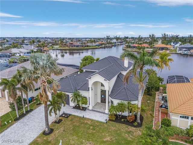 bird's eye view with a water view