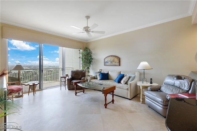 living room featuring ornamental molding and ceiling fan