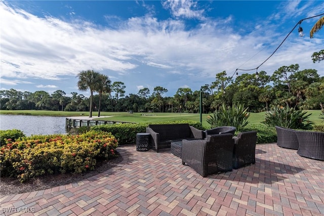 view of patio with a water view