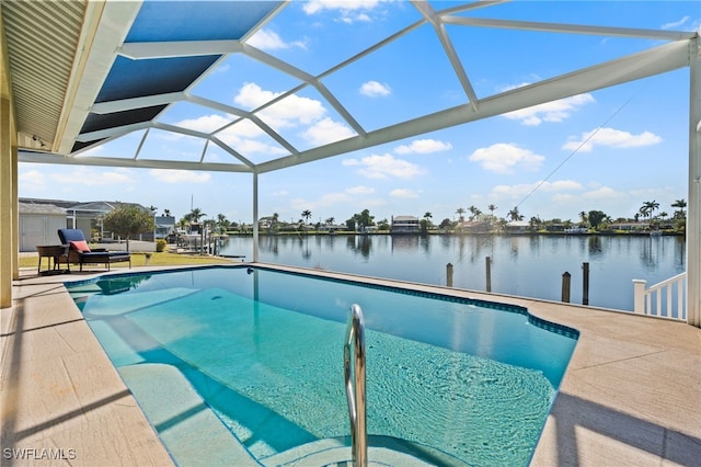 view of swimming pool with a lanai, a patio area, and a water view