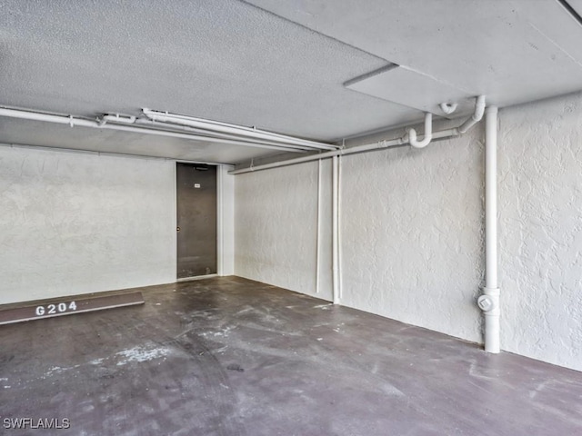 basement with a textured ceiling