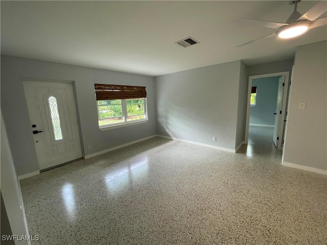 spare room with ceiling fan