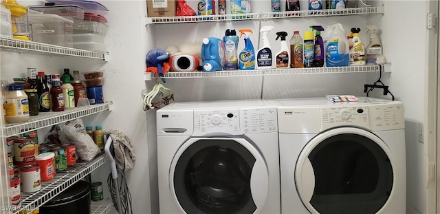 laundry room with independent washer and dryer