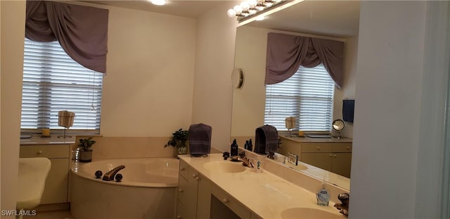 bathroom featuring a tub and vanity