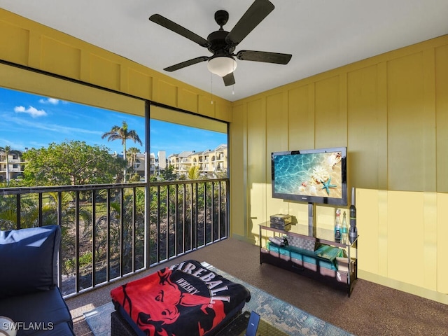 sunroom / solarium with ceiling fan