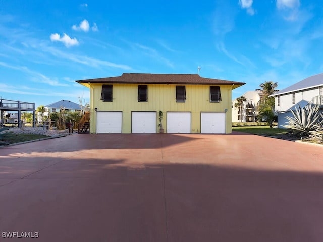 exterior space with a garage