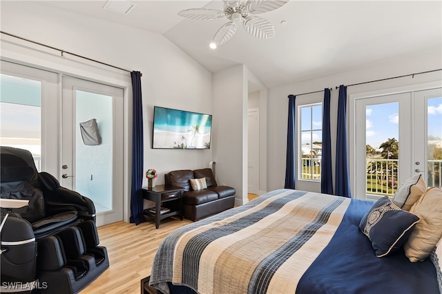 bedroom featuring french doors, vaulted ceiling, light hardwood / wood-style flooring, ceiling fan, and access to exterior