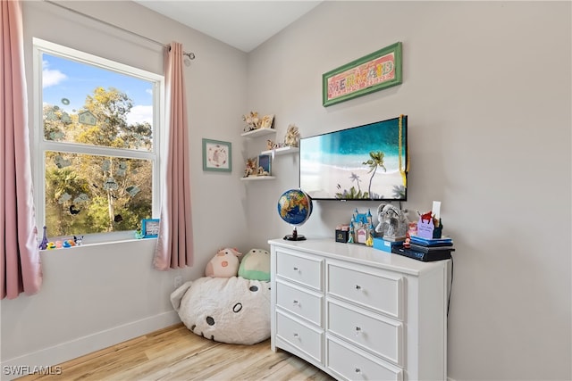 bedroom with light wood-type flooring