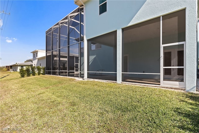 3967 Skyway Dr Unit 14, Naples, FL 34112 - view of green lawn with a lanai
