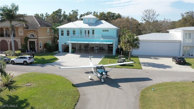 view of front of property with a balcony