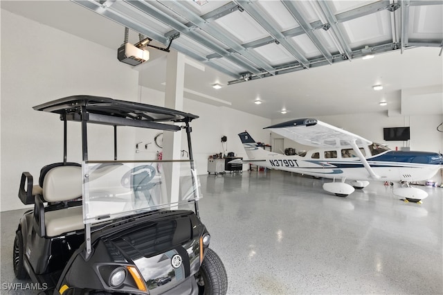 3967 Skyway Dr Unit 14, Naples, FL 34112 - garage with a garage door opener