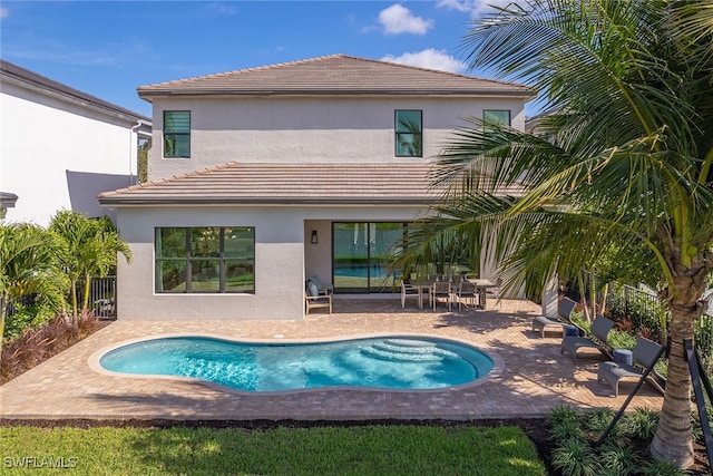 back of house featuring a patio