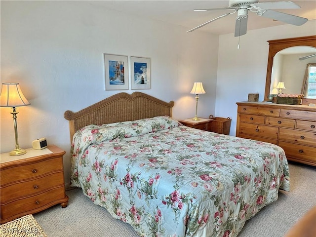 carpeted bedroom featuring a ceiling fan