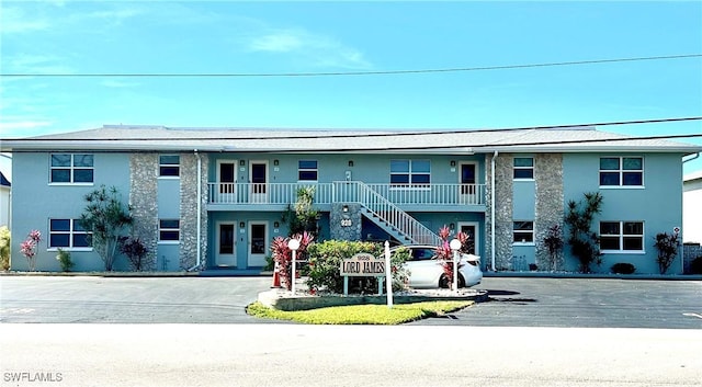 928 SE 46th St Unit 2C, Cape Coral, FL 33904 - view of property with stairway