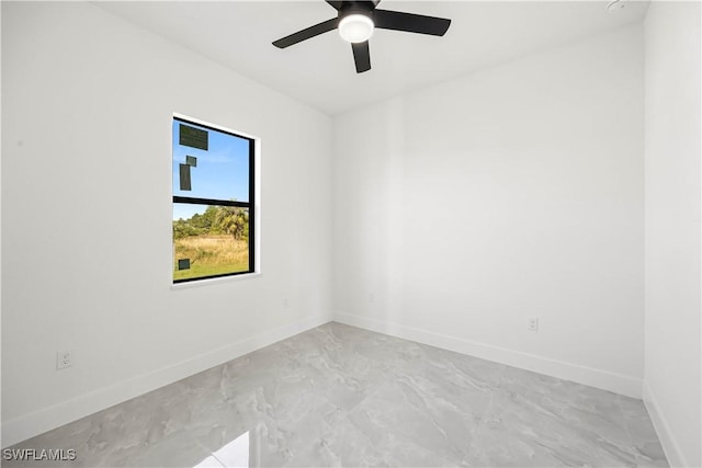 spare room featuring ceiling fan