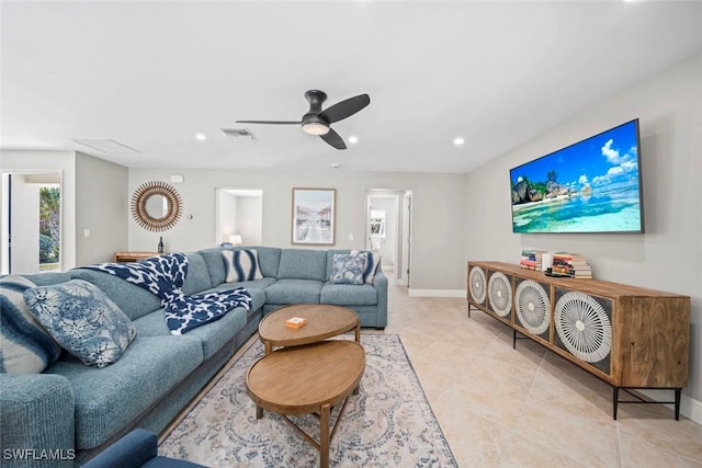 living room with light tile patterned floors, recessed lighting, visible vents, a ceiling fan, and baseboards