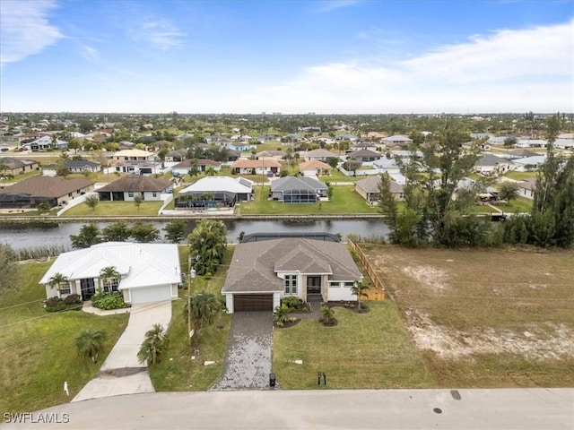 drone / aerial view featuring a water view