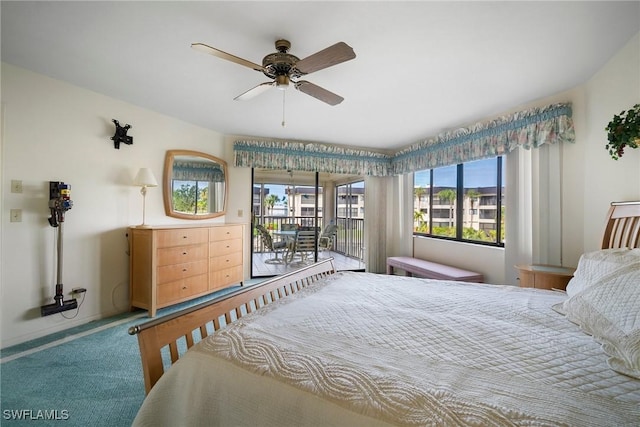 carpeted bedroom featuring ceiling fan and access to exterior