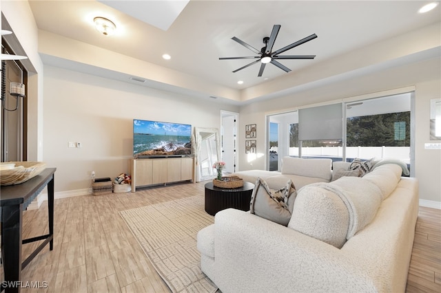 living room featuring ceiling fan