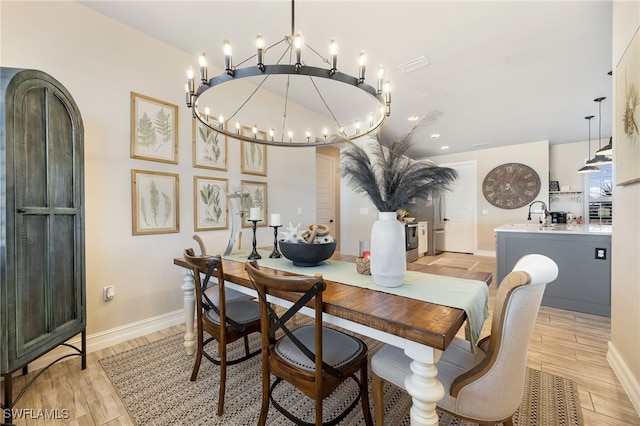 dining room featuring a notable chandelier