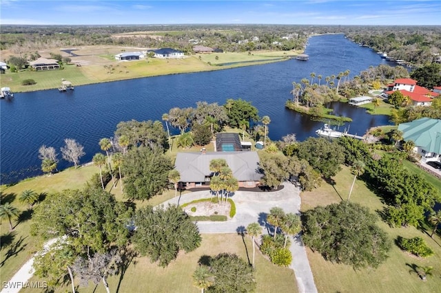 birds eye view of property with a water view