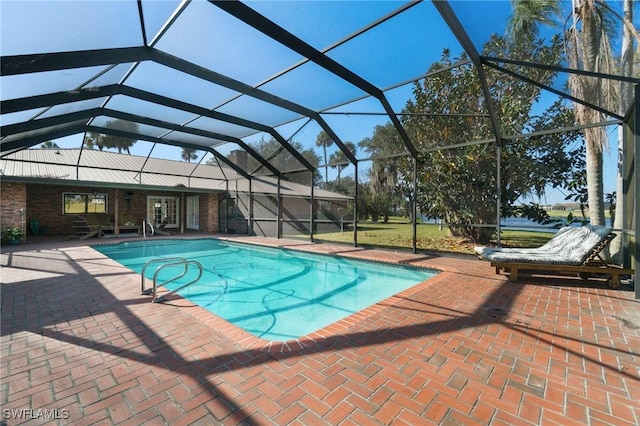 view of pool featuring a lanai and a patio area