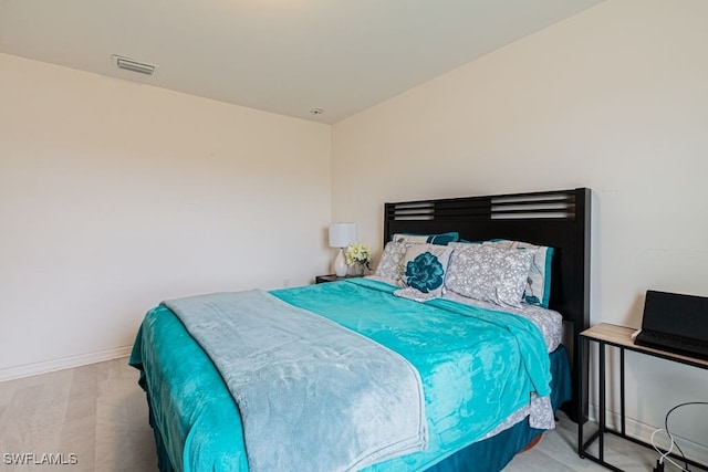 bedroom featuring light hardwood / wood-style floors