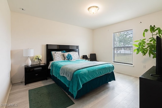 bedroom featuring light hardwood / wood-style flooring