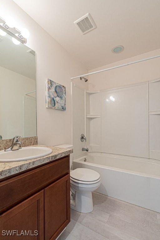 full bathroom with bathtub / shower combination, vanity, and toilet