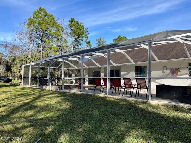 surrounding community featuring a patio area and a lawn