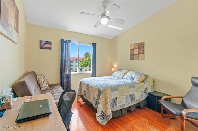 bedroom featuring ceiling fan and wood-type flooring