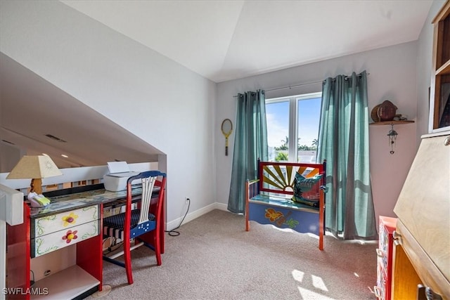 home office featuring carpet floors and lofted ceiling