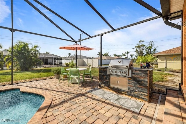 view of patio featuring area for grilling, a lanai, and a grill