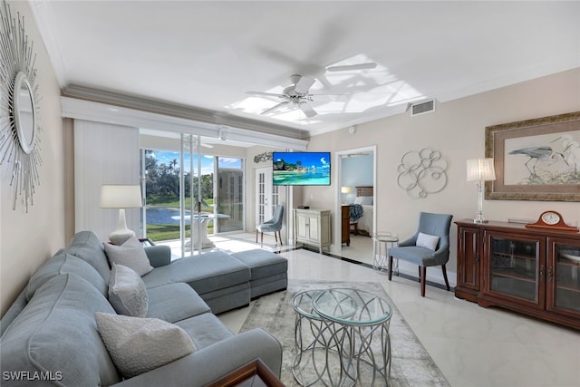 living room featuring ceiling fan and ornamental molding