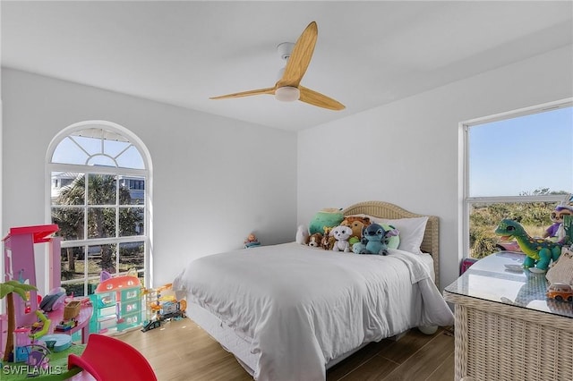 bedroom featuring ceiling fan and hardwood / wood-style floors