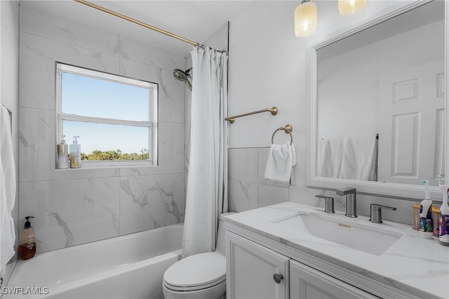 full bathroom with vanity, shower / bath combination with curtain, and toilet