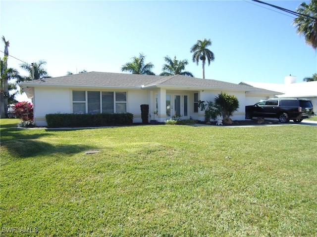 ranch-style home with a front yard