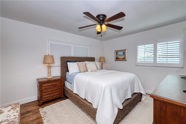 bedroom featuring ceiling fan and wood-type flooring