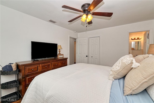 bedroom with connected bathroom and ceiling fan