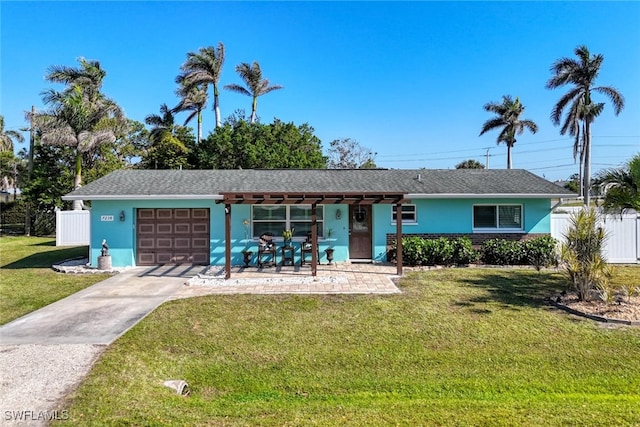 ranch-style house with a front lawn and a garage