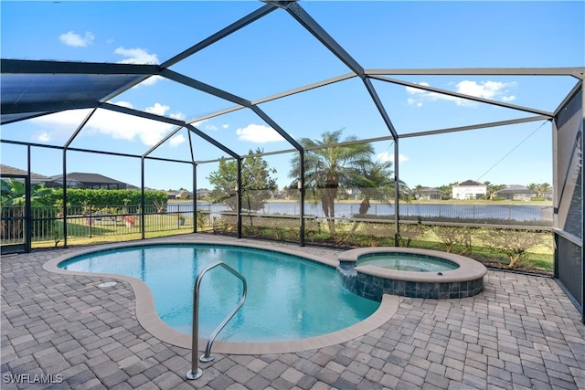 view of pool with a patio, a water view, and a lanai