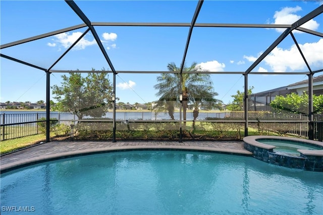 view of swimming pool with glass enclosure, a water view, and a pool with connected hot tub